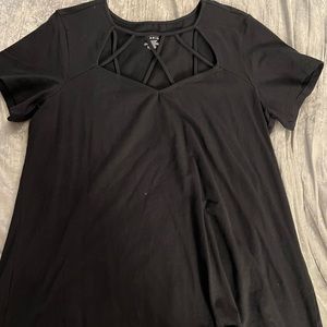Torrid black short sleeve shirt with cage detail on the neckline. Size 3.